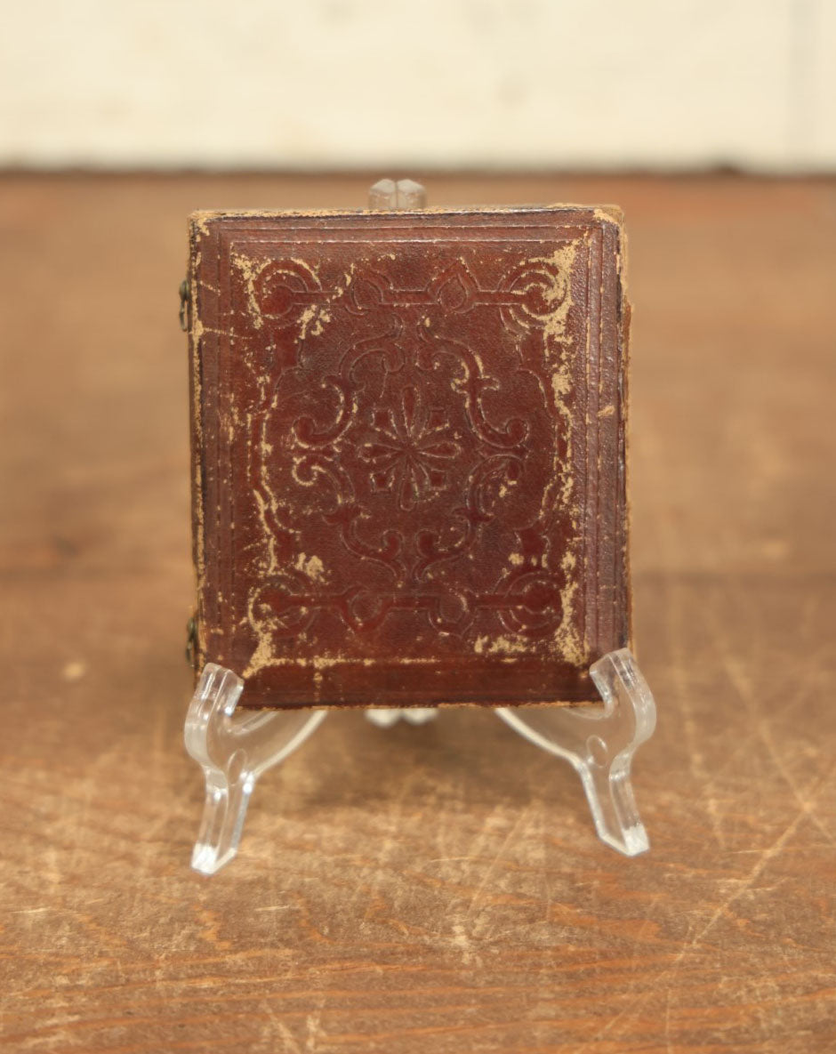 Lot 010 - Antique 1/6th Plate Daguerreotype Photograph Of A Pretty Young Woman With Curls And A Dress Holding A Book, In Half Case, With Octogonal Cut Mat