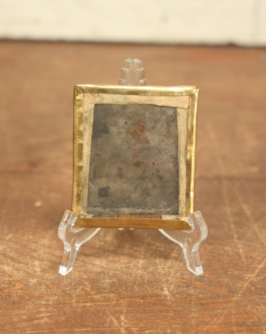 Lot 011 - Antique 1/6th Plate Daguerreotype Of A Young Woman With Short Dark Hair, A Ribbon, Bracelet, And Ring, Under Brass Mat, No Case