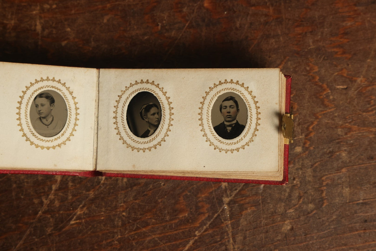 Lot 014 - Antique Gem Tintype Photo Album, Belonging To Ella Lo Whitney, From Her Teacher Sarah Barnard, Completely Full Containing 48 Photographs, Gold Embellishments On Cover