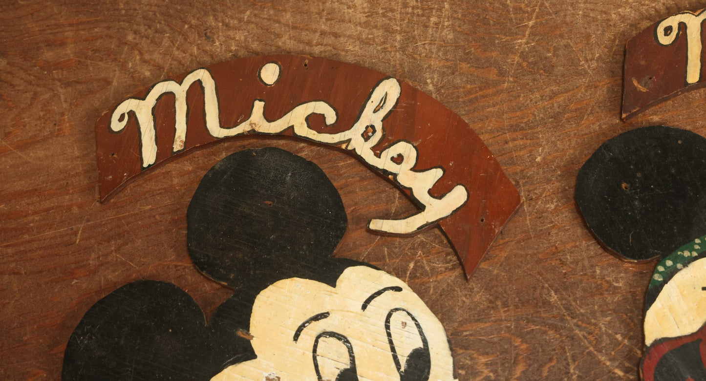 Lot 021 - Pair Of Vintage Folk Art Mickey Mouse And Minnie Mouse Scroll Cut Wood Faces, Hand Painted, With Name Ribbons, Note Mickey Missing Nose