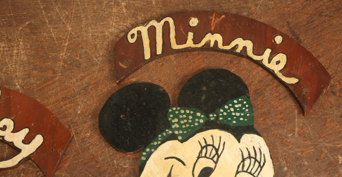 Lot 021 - Pair Of Vintage Folk Art Mickey Mouse And Minnie Mouse Scroll Cut Wood Faces, Hand Painted, With Name Ribbons, Note Mickey Missing Nose