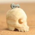 Lot 022 - Vintage Miniature Carved Bone Skull Charm With Hoop