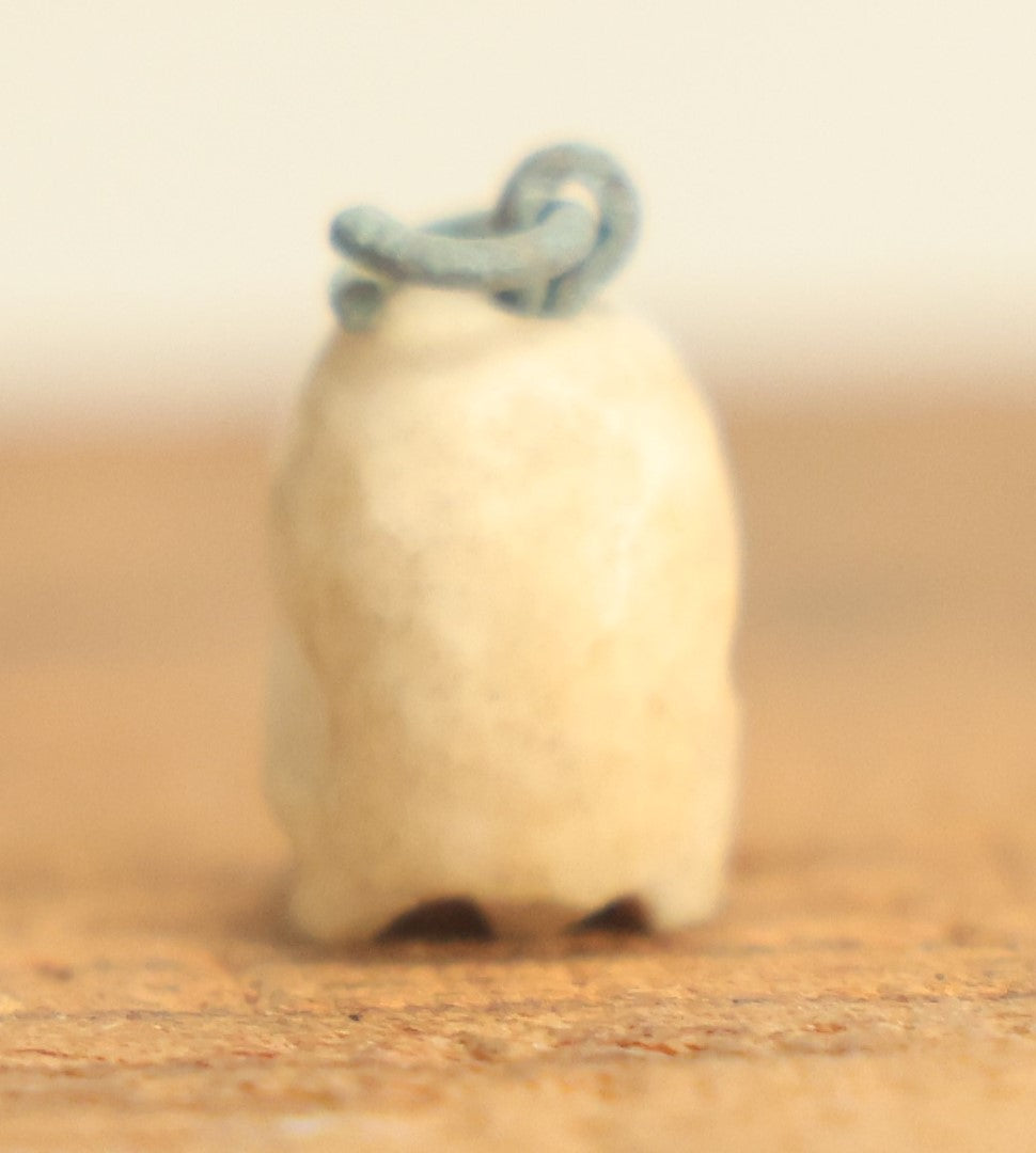 Lot 022 - Vintage Miniature Carved Bone Skull Charm With Hoop