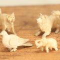 Lot 023 - Grouping Of Six Miniature Carved Bone Animals: Cat, Owl, Pigeon, Elephant, And Two Dogs, Plus Two Bonus Wooden Animals