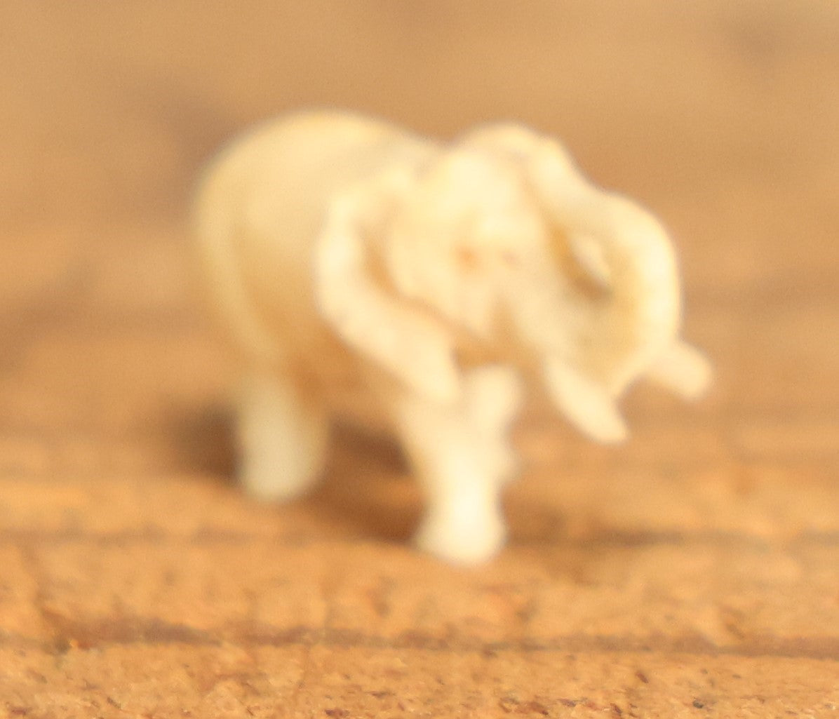 Lot 023 - Grouping Of Six Miniature Carved Bone Animals: Cat, Owl, Pigeon, Elephant, And Two Dogs, Plus Two Bonus Wooden Animals