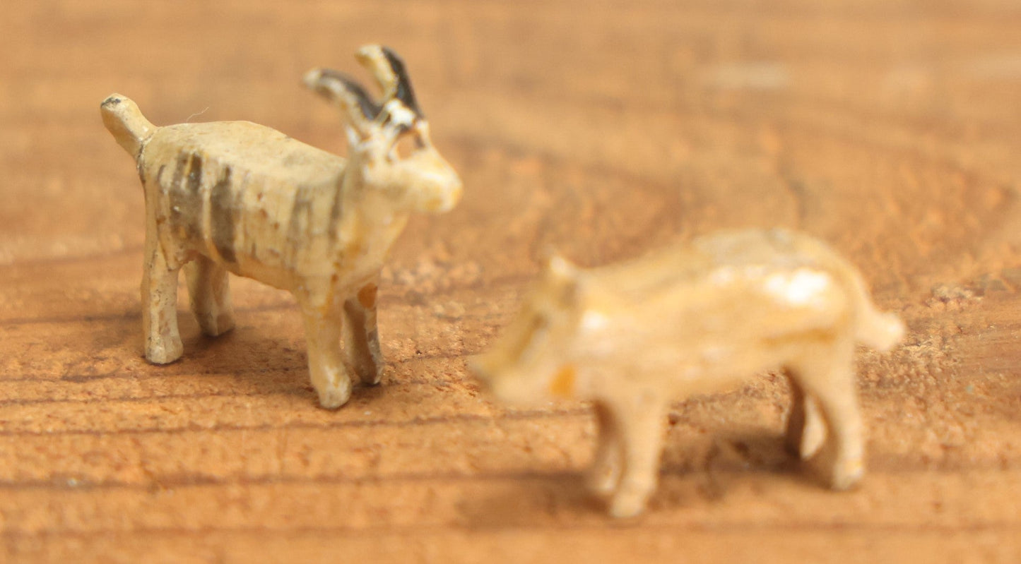 Lot 023 - Grouping Of Six Miniature Carved Bone Animals: Cat, Owl, Pigeon, Elephant, And Two Dogs, Plus Two Bonus Wooden Animals