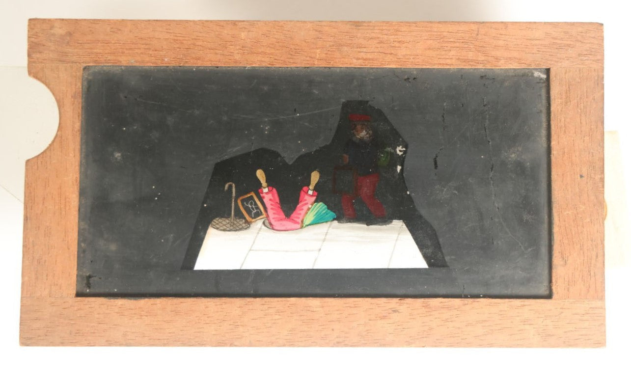 Lot 042 - Antique Hand Painted Animated Magic Lantern Motion Slide, Schoolboy With Chalk Tablet Falls Down Open Manhole