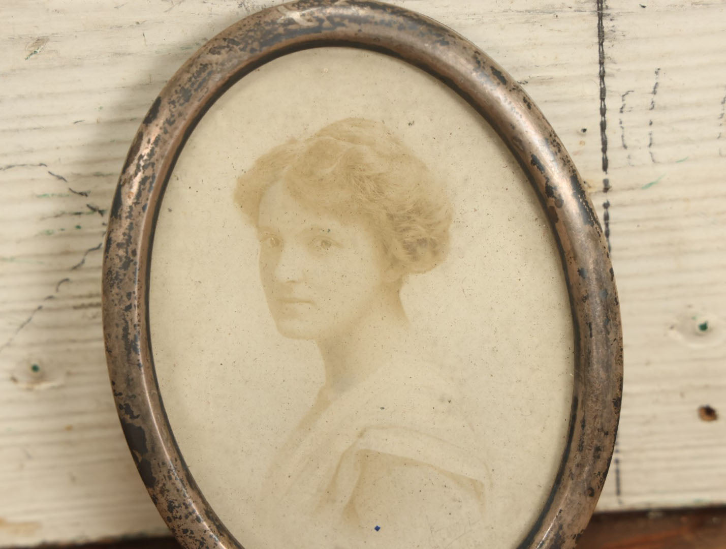 Lot 064 - Antique Photo Of Young Woman In Tarnished Sterling Silver Oval Frame, Missing Kickstand, Marked Sterling