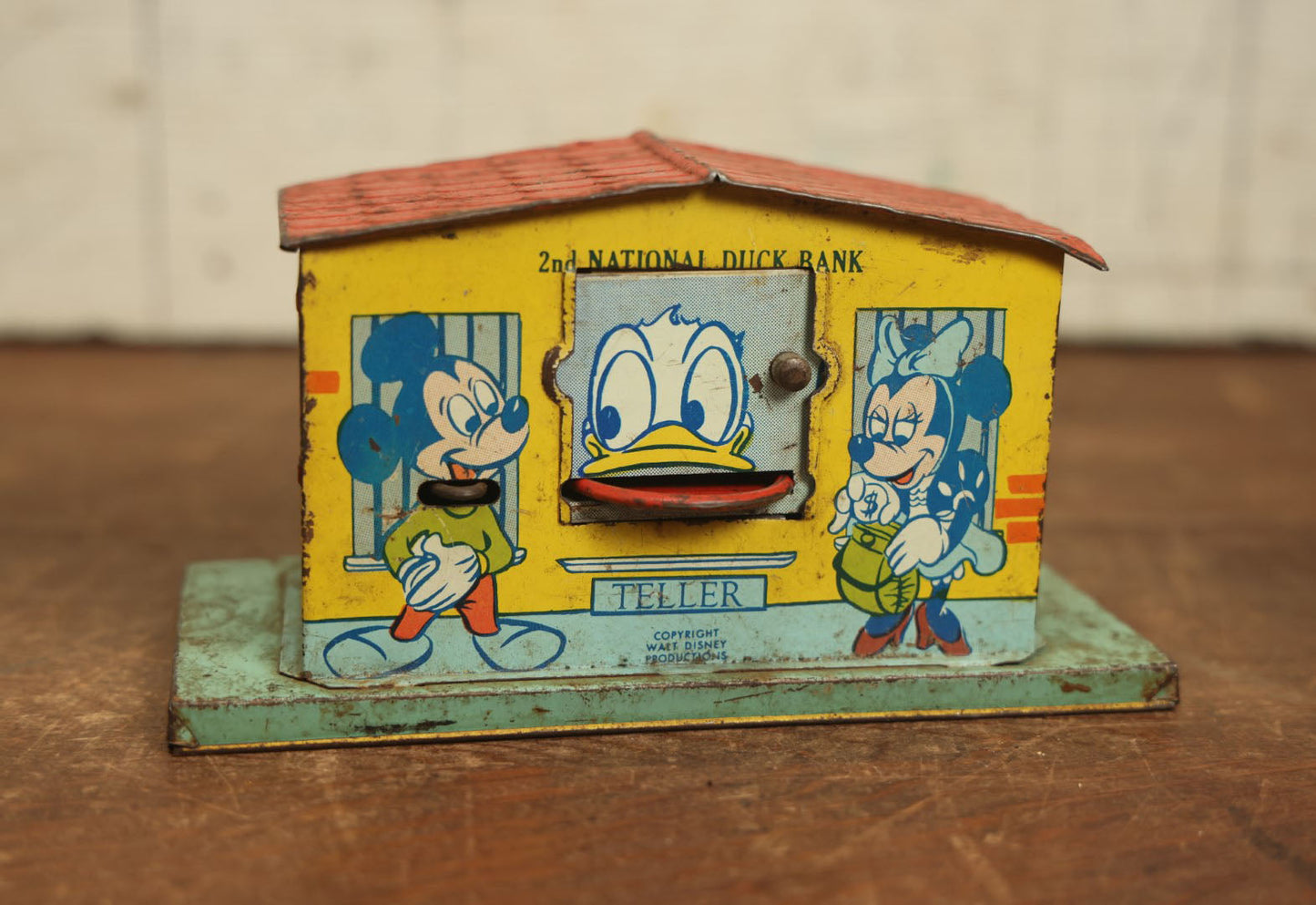 Lot 070 - Vintage Tin Lithograph 2Nd National Duck Walt Disney Bank With Mickey Mouse, Minnie Mouse, Donald Duck, Goofy, Pluto, And Pinnochio, By J. Chein & Co.