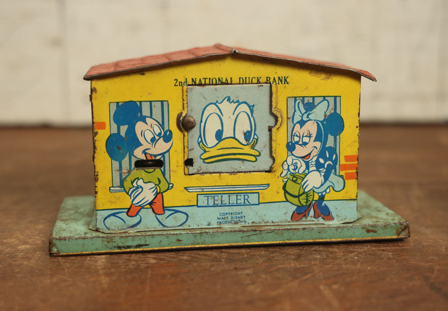 Lot 070 - Vintage Tin Lithograph 2Nd National Duck Walt Disney Bank With Mickey Mouse, Minnie Mouse, Donald Duck, Goofy, Pluto, And Pinnochio, By J. Chein & Co.