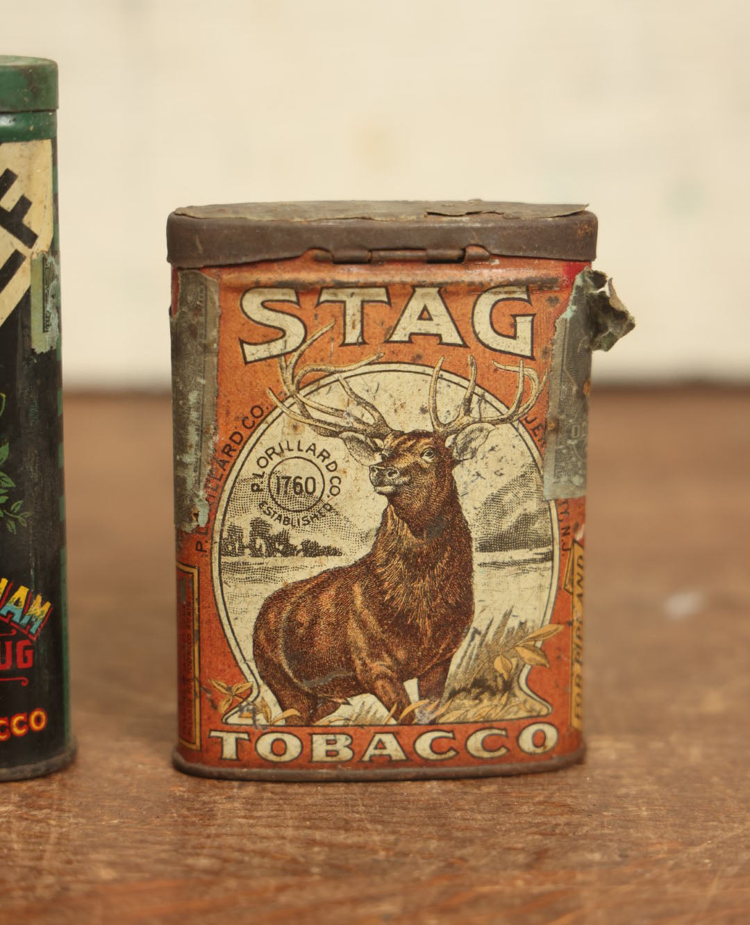 Lot 072 - Pair Of Vintage Tin Lithograph Tobacco Tins - Stag Tobacco And Lucky Strike Half And Half