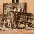 Lot 105 - Grouping Of Three Exterior Tintype Group Photographs With Fourteen People, Same Photo With Different Poses