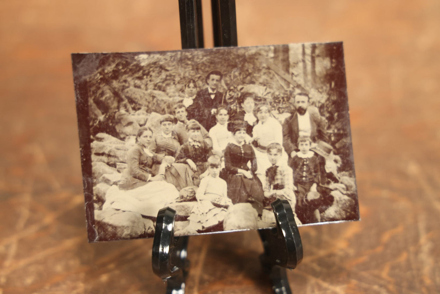 Lot 105 - Grouping Of Three Exterior Tintype Group Photographs With Fourteen People, Same Photo With Different Poses