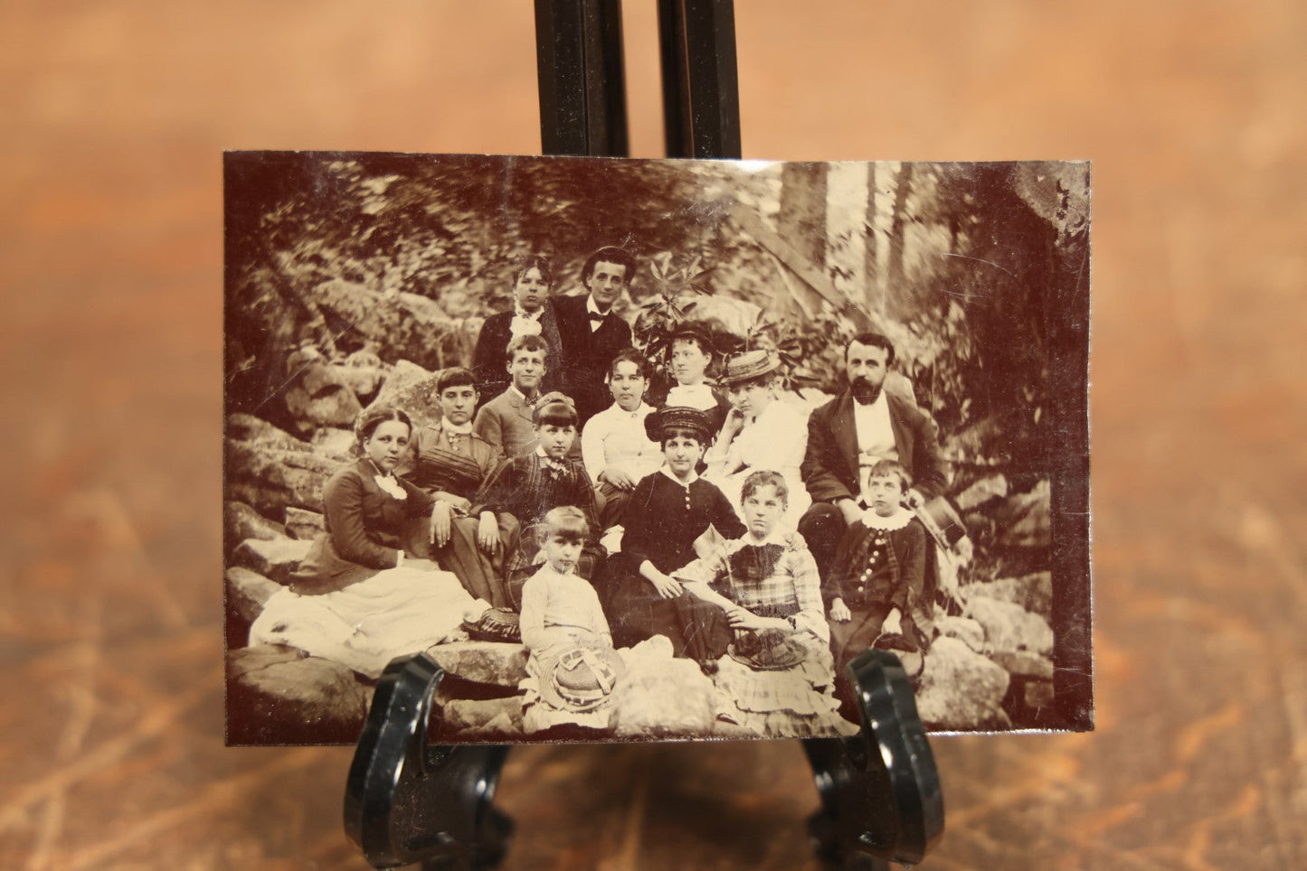 Lot 105 - Grouping Of Three Exterior Tintype Group Photographs With Fourteen People, Same Photo With Different Poses