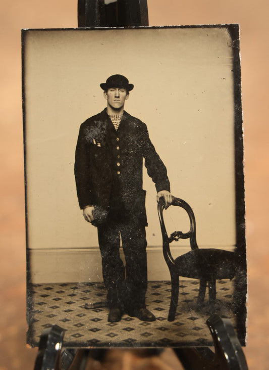 Lot 106 - Single Antique Tintype Photograph Of A Tall Man With A Bowler Hat And Chiseled Jawline