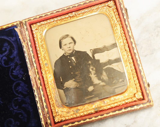 Lot 006 - Antique 1/6Th Plate Ambrotype Photograph Of A Young Boy With Spaniel Dog In Full Leatherette Union Case With Blue Purple Pillow