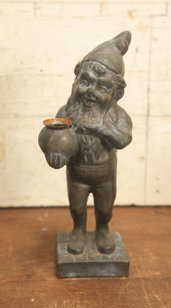 Lot 013 - Vintage Cast Metal Garden Gnome Holding Pot