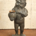 Lot 013 - Vintage Cast Metal Garden Gnome Holding Pot