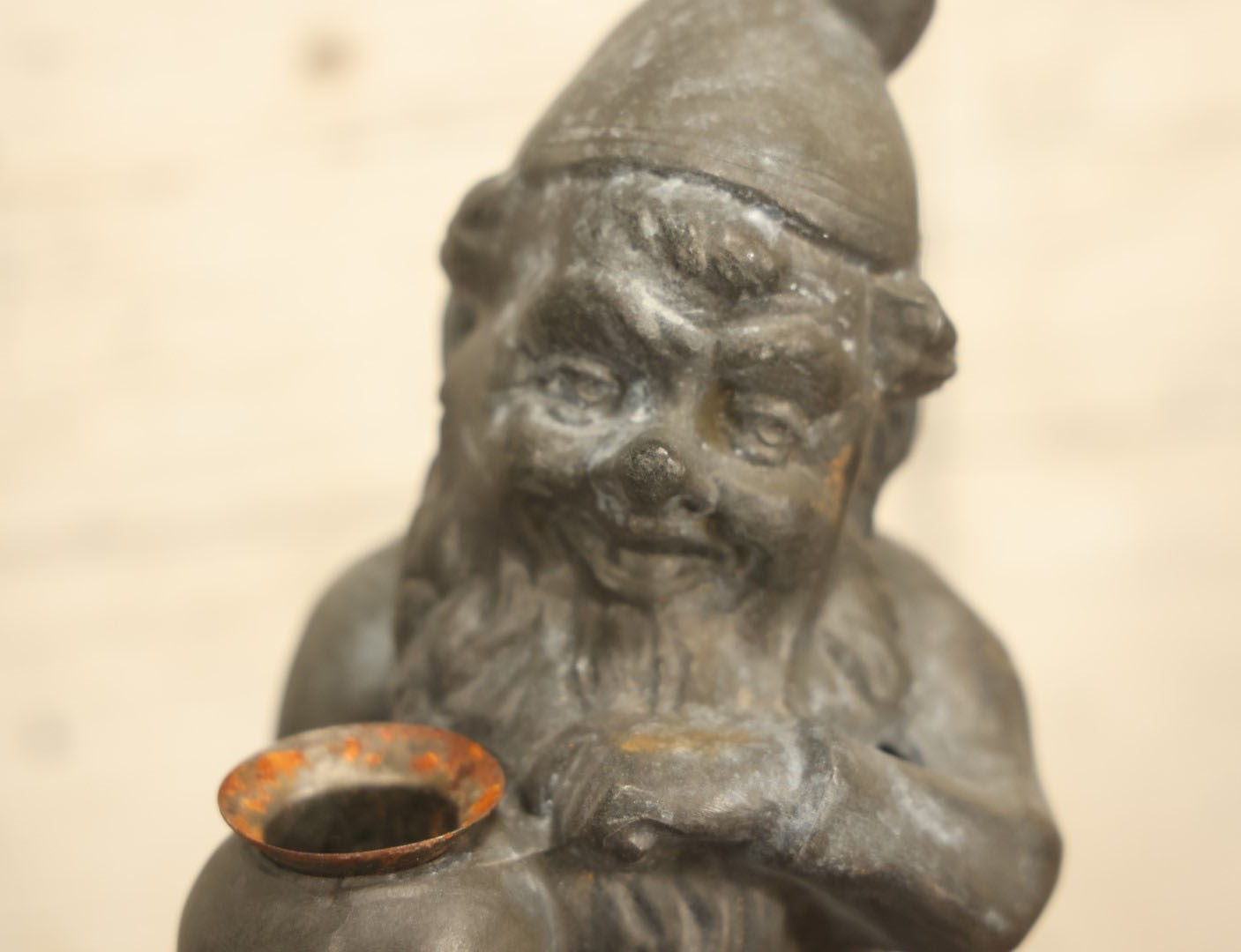 Lot 013 - Vintage Cast Metal Garden Gnome Holding Pot