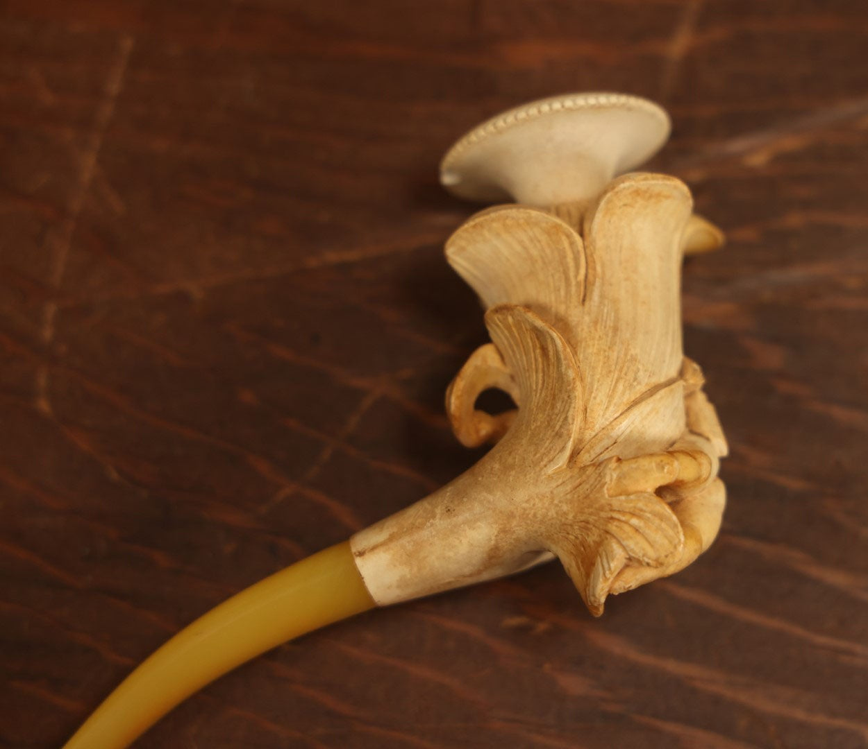 Lot 014 - Antique Genuine Carved Meerschaum Pipe With Cupid Cherub, Yellow Stem, And Original Custom Case. Marked C.P.F. Warranted