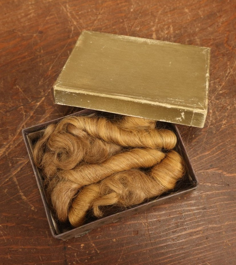 Lot 016 - Vintage Box Of Clipped Blonde Hair Curls And Tufts Of Brown Hair, Keepsake Memento