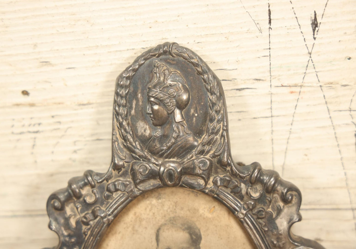 Lot 021 - Antique Tin Frame, Souvenir Of Kansas City, Dated 1910, With Owl And Serpent, Containing A Photo Of A Young Boy Seated In A Chair