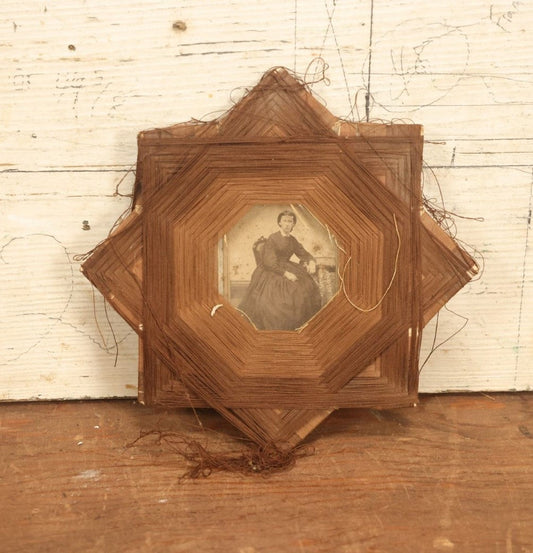 Lot 022 - Antique String Folk Art Frame With C.D.V. Photograph Of A Young Woman Seated In A Chair, Note Some String Unwound