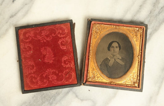 Lot 041 - Antique 1/6Th Plate Ambrotype Photograph Of A Young Woman With A White Bow, Likely A Member Of The Slack Family, In Split Leatherette Union Case