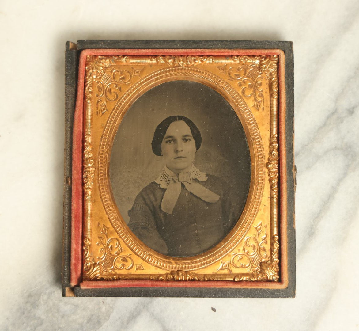 Lot 041 - Antique 1/6th Plate Ambrotype Photograph Of A Young Woman With A White Bow, Likely A Member Of The Slack Family, In Split Leatherette Union Case