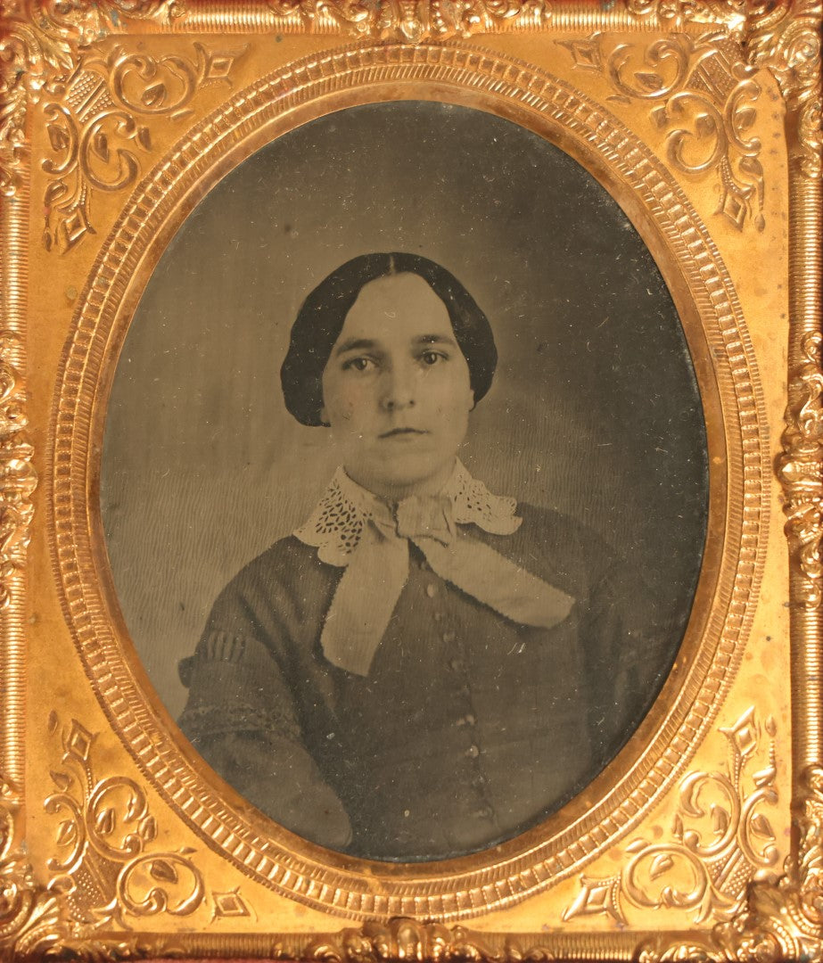 Lot 041 - Antique 1/6th Plate Ambrotype Photograph Of A Young Woman With A White Bow, Likely A Member Of The Slack Family, In Split Leatherette Union Case