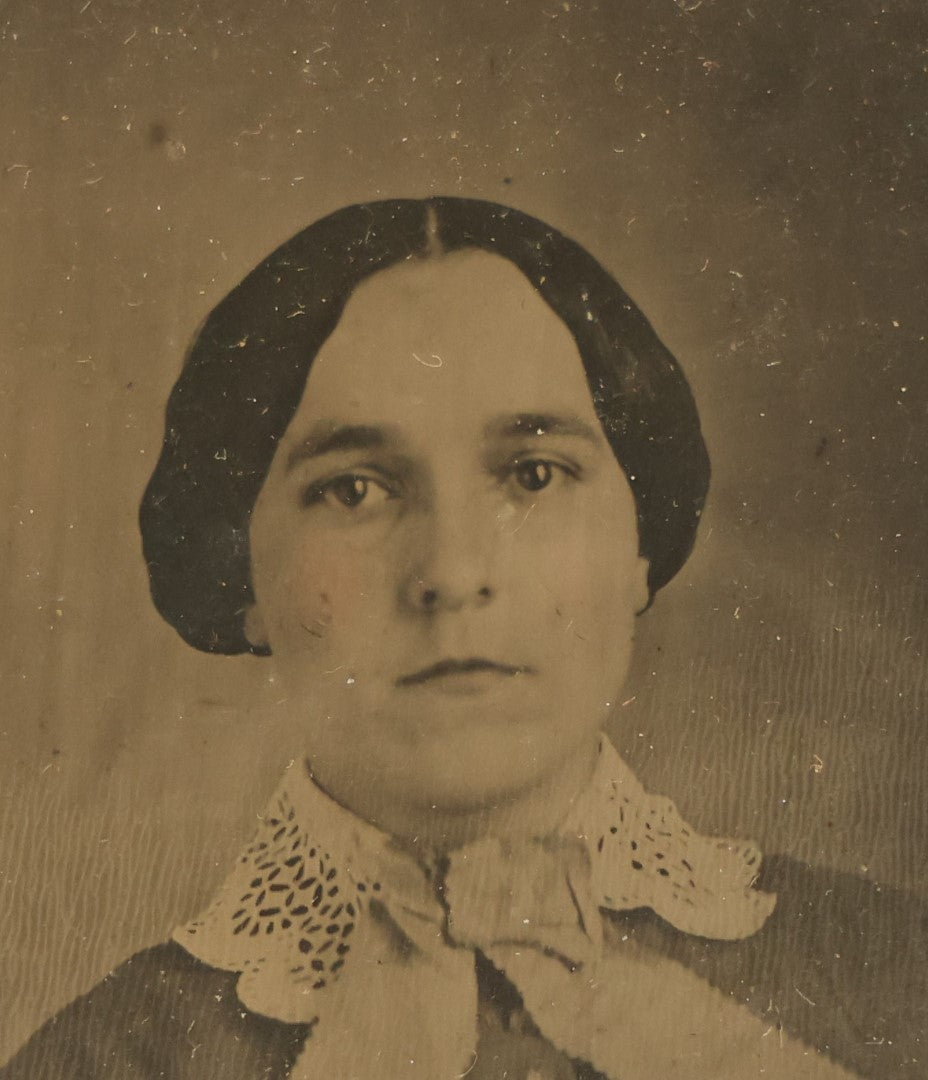 Lot 041 - Antique 1/6th Plate Ambrotype Photograph Of A Young Woman With A White Bow, Likely A Member Of The Slack Family, In Split Leatherette Union Case