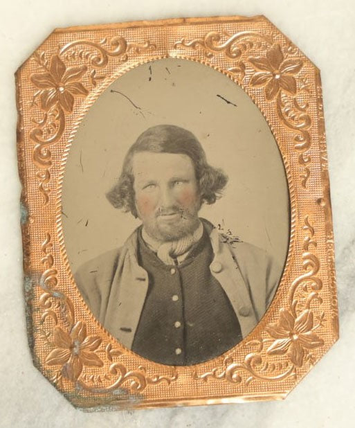 Lot 044 - Antique 1/9Th Plate Tintype In Brass Mat Of A Middle Aged Bearded Man With Rosy Tinted Pink Cheeks, Slight Grin