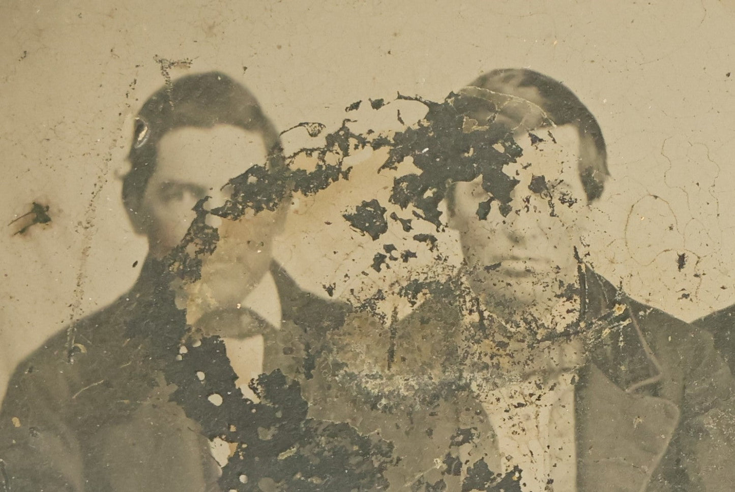 Lot 045 - Craft Grade Approximately 1/4 Plate Ambrotype Of Three Men And A Woman, Note Heavy Wear, Losses, No Frame