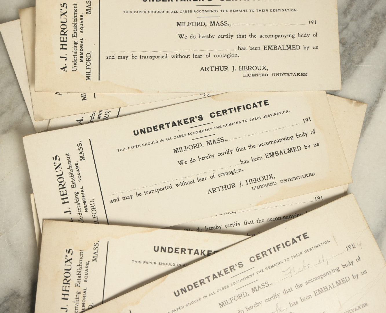 Lot 047 - Grouping Of Nine Blank Antique Undertaker'S Toe Tag Certificates From Arthur J. Heroux, Licensed Undertaker, Milford, Massachusetts, Circa 1910