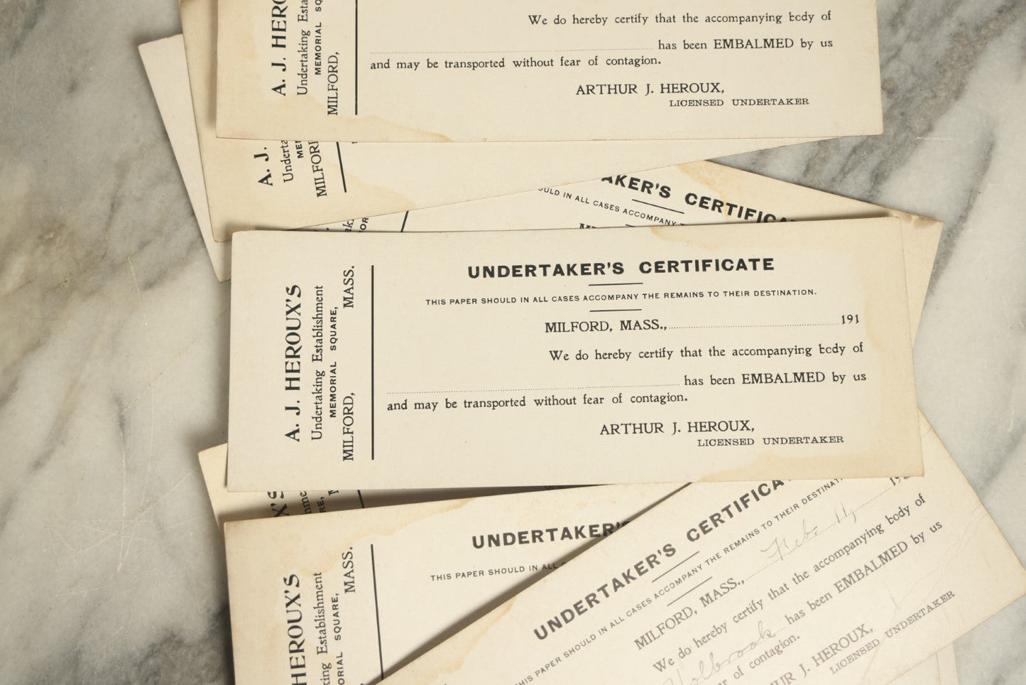 Lot 047 - Grouping Of Nine Blank Antique Undertaker's Toe Tag Certificates From Arthur J. Heroux, Licensed Undertaker, Milford, Massachusetts, Circa 1910