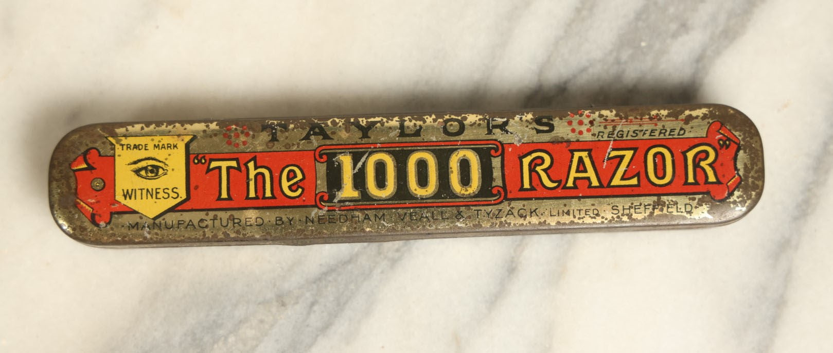 Lot 086 - Single Antique Advertising Tin, Taylor'S "The 1000 Razor" Manufactured By Needham Veall & Tyzack Limited, Sheffield