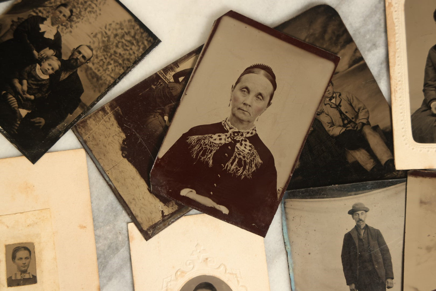 Lot 092 - Grouping Of Antique Tintype Portrait Photographs Of Men, Women, And Children, Including Some With Multiple People, Varying Conditions