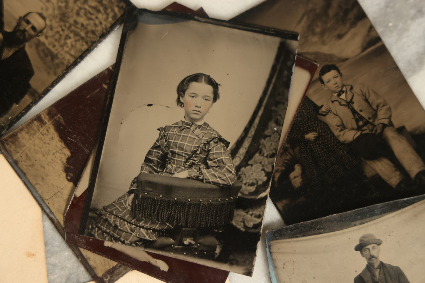 Lot 092 - Grouping Of Antique Tintype Portrait Photographs Of Men, Women, And Children, Including Some With Multiple People, Varying Conditions