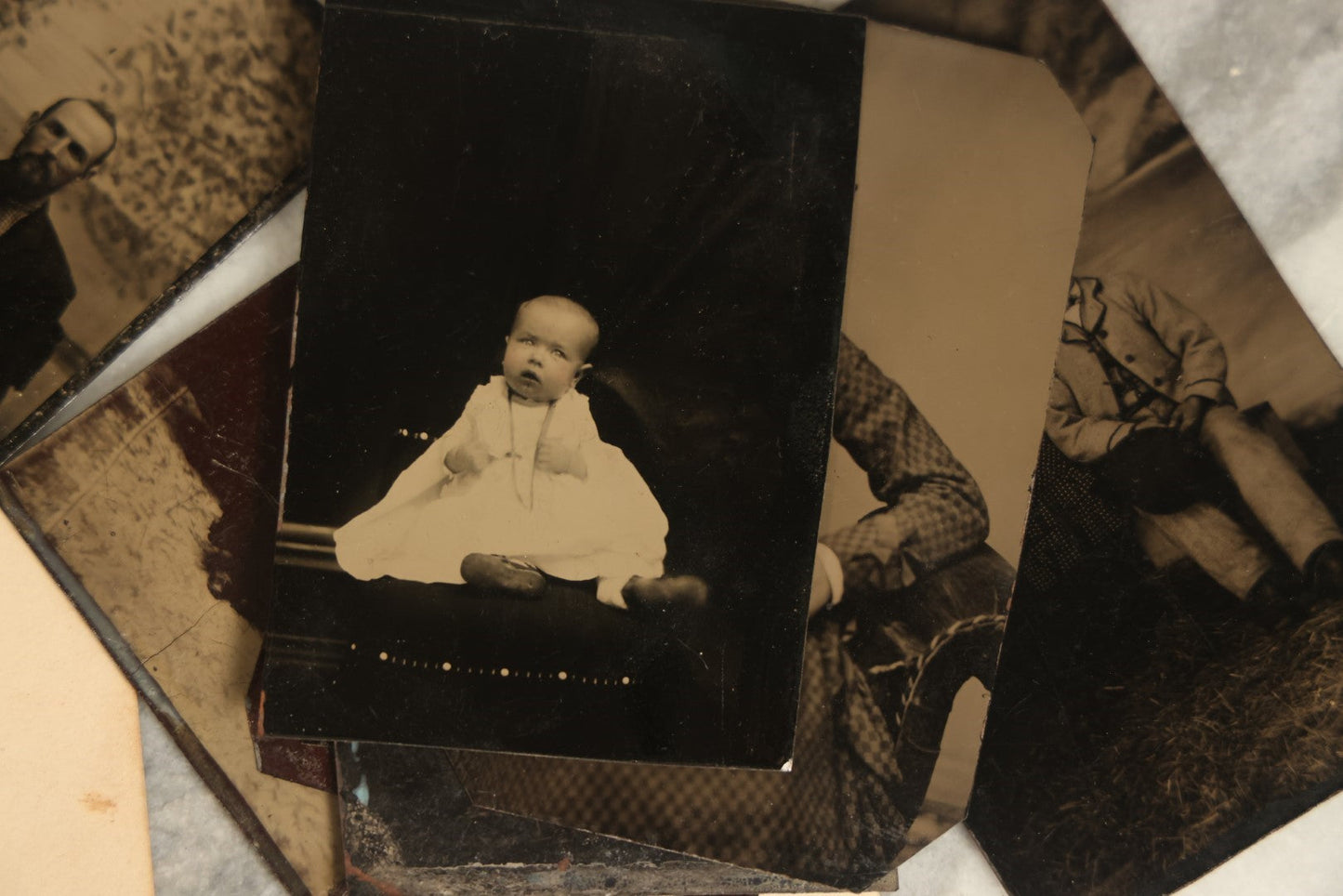 Lot 092 - Grouping Of Antique Tintype Portrait Photographs Of Men, Women, And Children, Including Some With Multiple People, Varying Conditions