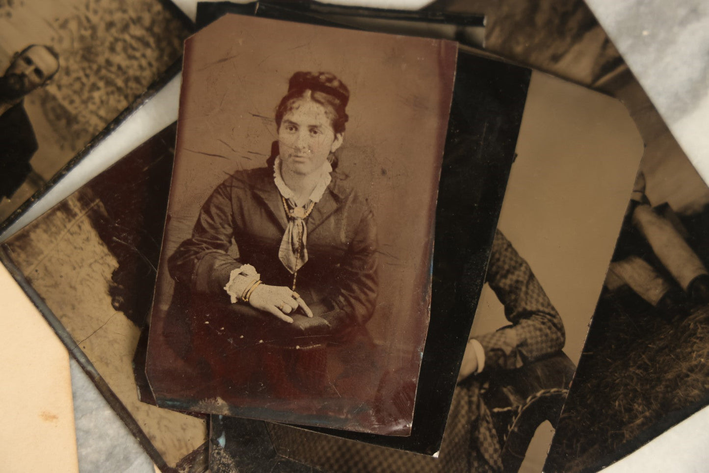 Lot 092 - Grouping Of Antique Tintype Portrait Photographs Of Men, Women, And Children, Including Some With Multiple People, Varying Conditions