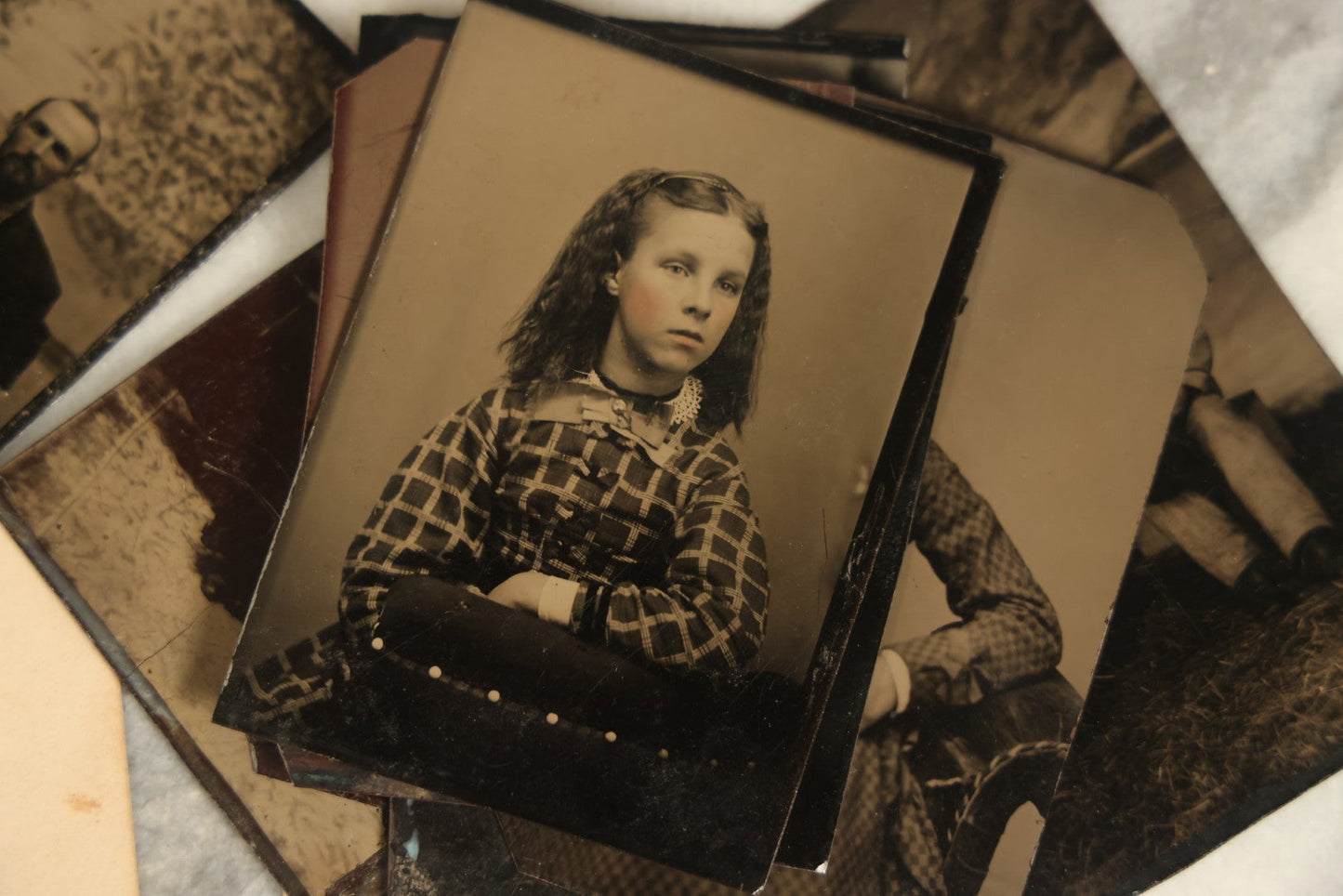 Lot 092 - Grouping Of Antique Tintype Portrait Photographs Of Men, Women, And Children, Including Some With Multiple People, Varying Conditions