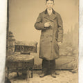 Lot 097 - Single Antique Tintype Photograph, Young Boy Smoking Cigar, In Long Coat