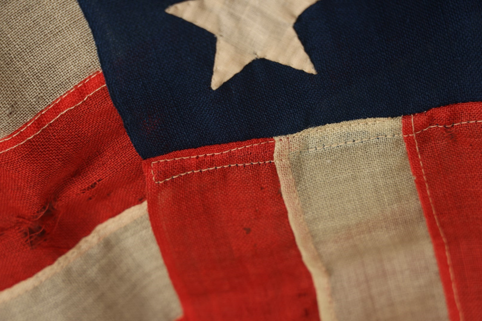 Lot 013 - Antique Hand Sewn United States Thirteen Star Flag, Circa Late 19th Century, Signed G.B. Cook., Note Various Holes And Wear 