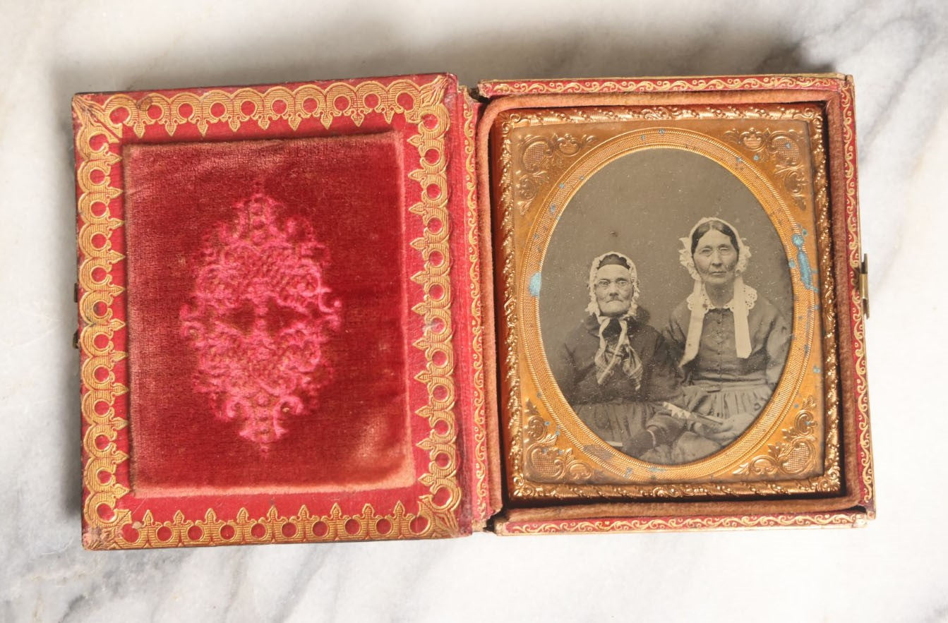 Lot 024 - Antique 1/6th Plate Ambrotype Of Two Elderly Woman In Ornate Mother Of Pearl "Memorial" Case, Red Pillow