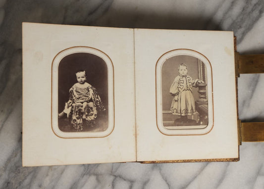 Lot 025 - Antique Tintype And Carte De Visite C.D.V. Victorian Photo Album Containing 33 C.D.V. Photos, 11 Tintypes, And Portraits Of George And Martha Washington, Hidden Mother