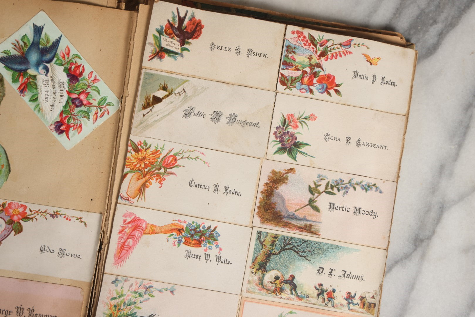 Lot 028 - Antique Victorian Trade Card Scrapbook Album With Woman In Red On Cover, Containing Many Scraps Including Rat Poison, Calling Card, Frogs, And More.