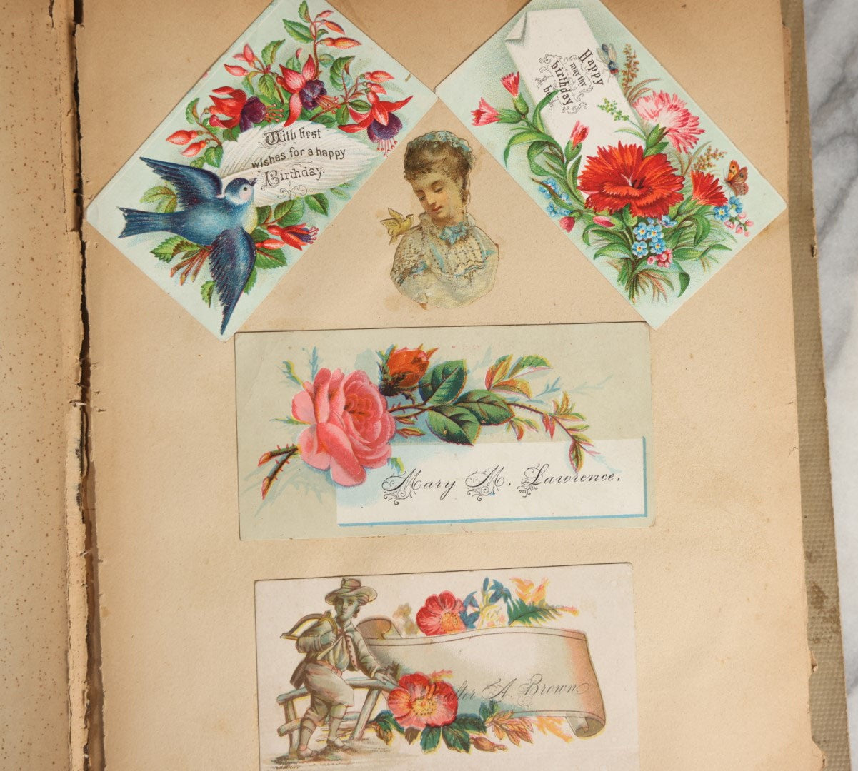 Lot 029 - Antique Victorian Trade Card Scrapbook Album With Two Girls And Puppy On Cover, Containing Many Scraps Including Rat Poison, Calling Card, Frogs, And More