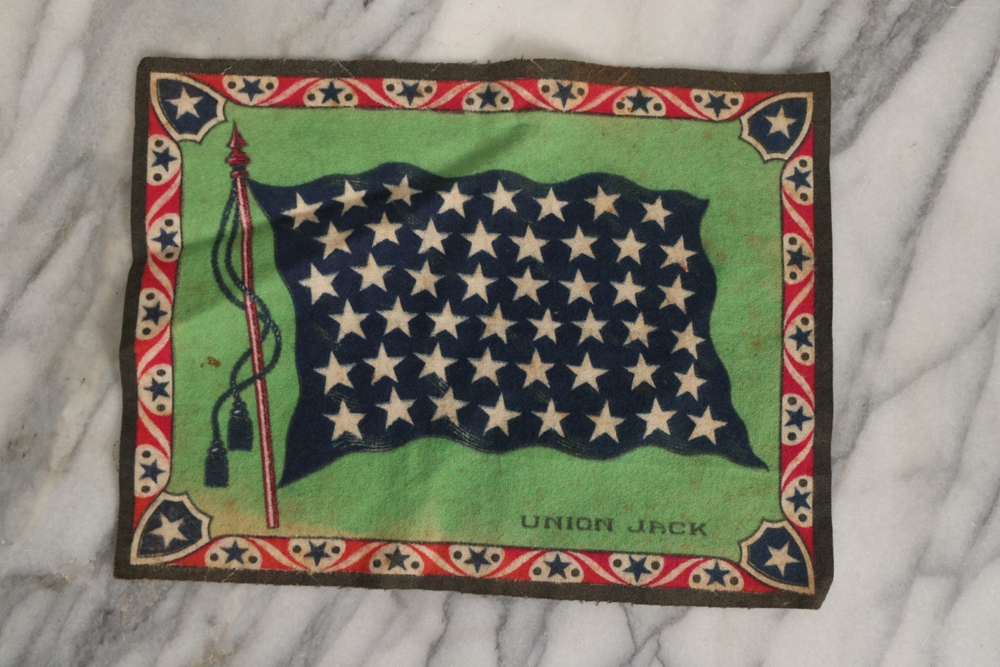 Lot 039 - Grouping Of Ten Antique Tobacco Felt Flags, Including Japan, 2 x Russia, Italy, Mexico, Cuba, Belgium, Netherlands, Austria-Hungary, And The Union Jack, Various Wear.