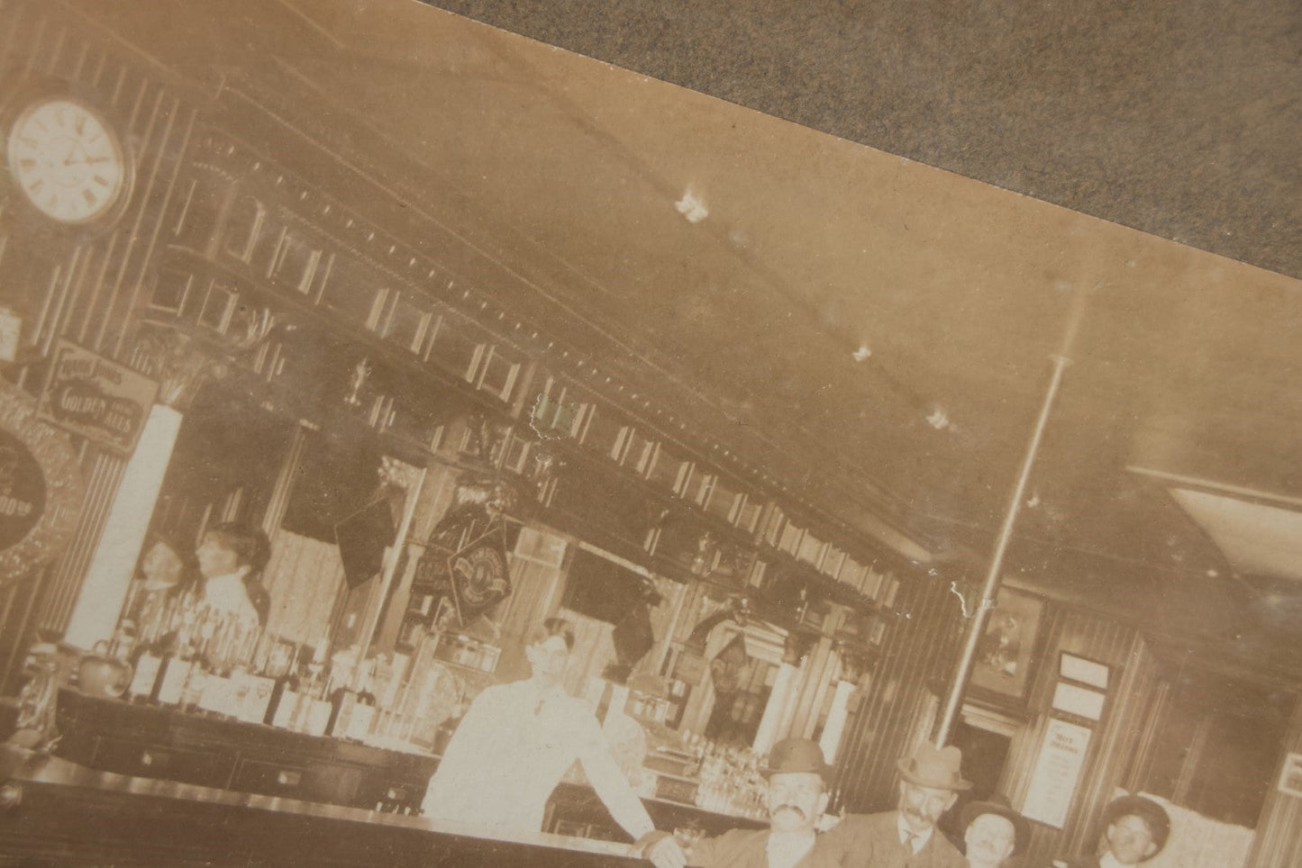 Lot 050 - Antique Framed Boarded Photograph Of A Bar Room, Four Men At The Bar With Barkeeper, Beer Advertisements, Etc