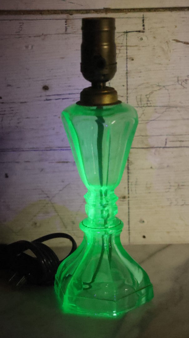 Lot 074 - Antique Uranium Glass Oil Lamp Converted To Electric Lamp, U.V. Black Light Reactive, Rewired With New Bulb Socket